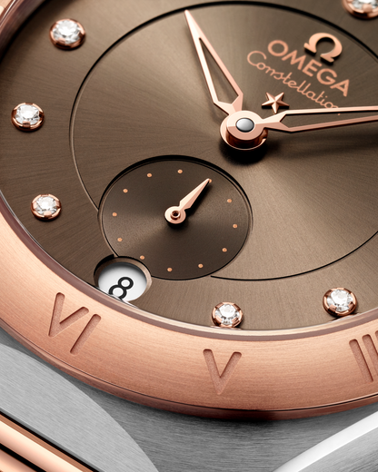 Constellation 34 mm, steel ‑ Sedna™ gold on steel ‑ Sedna™ gold