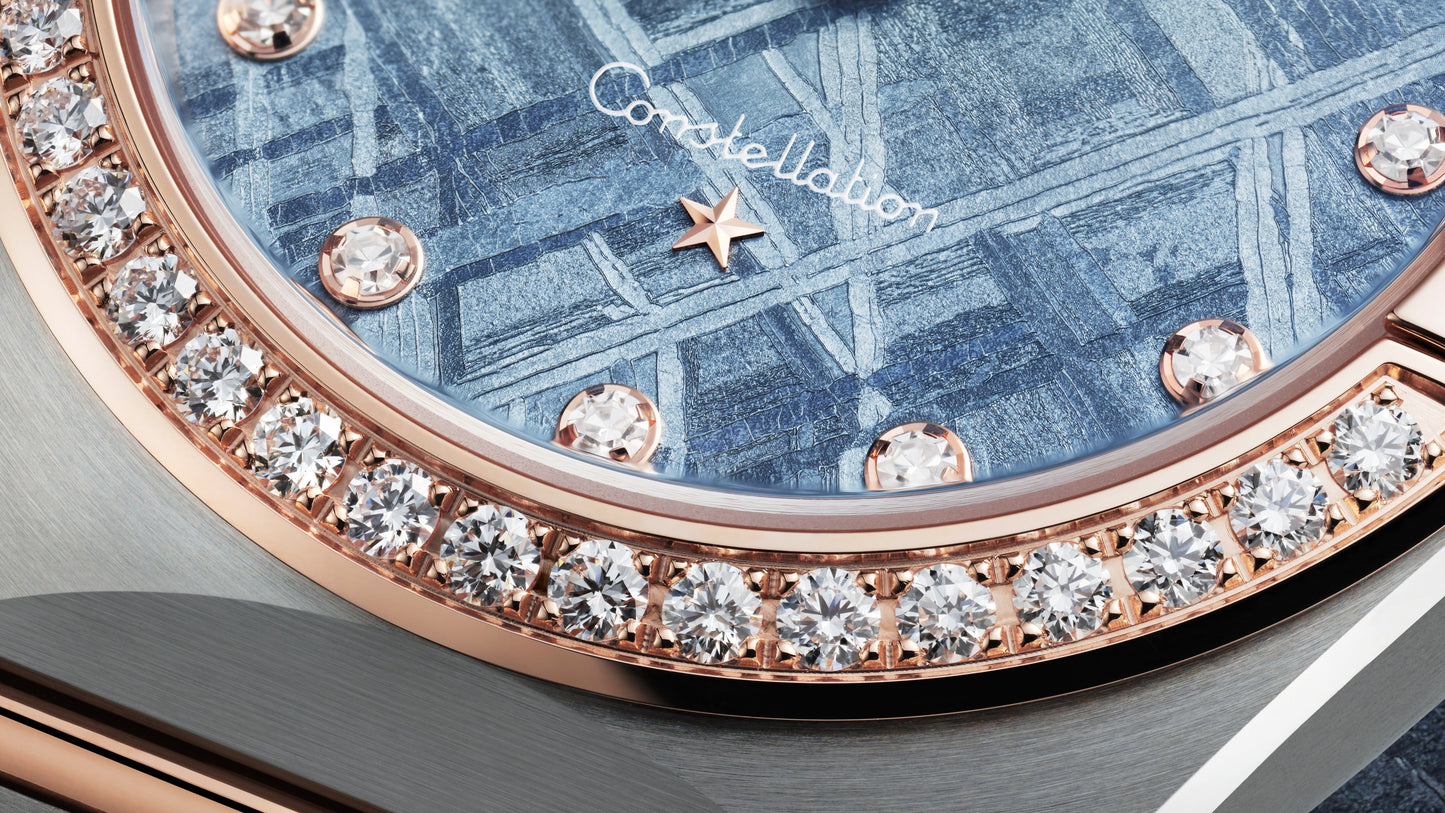 Constellation 28 mm, steel ‑ Sedna™ gold on steel ‑ Sedna™ gold