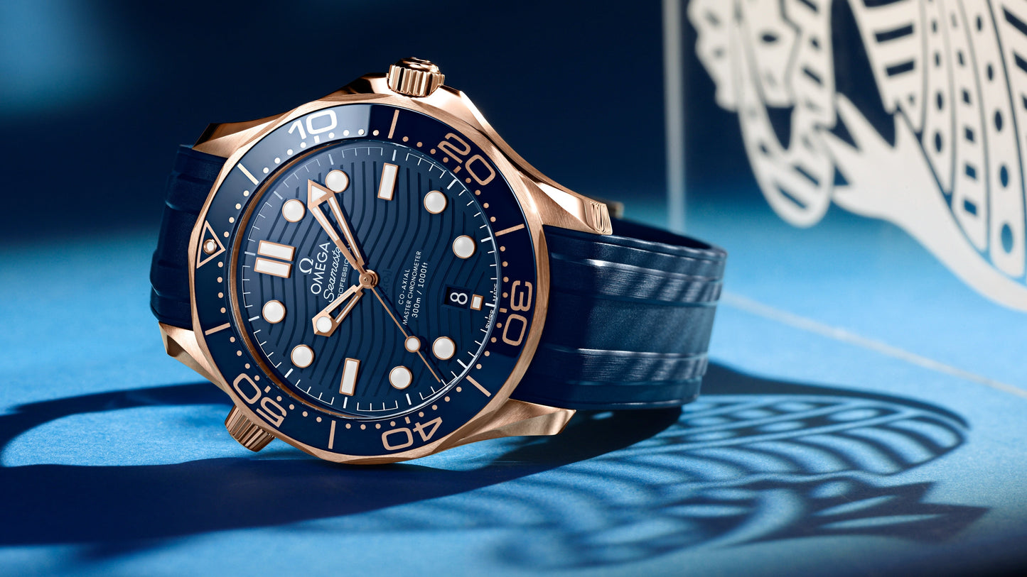 Seamaster Diver 300M 42 mm, Sedna™ gold on rubber strap