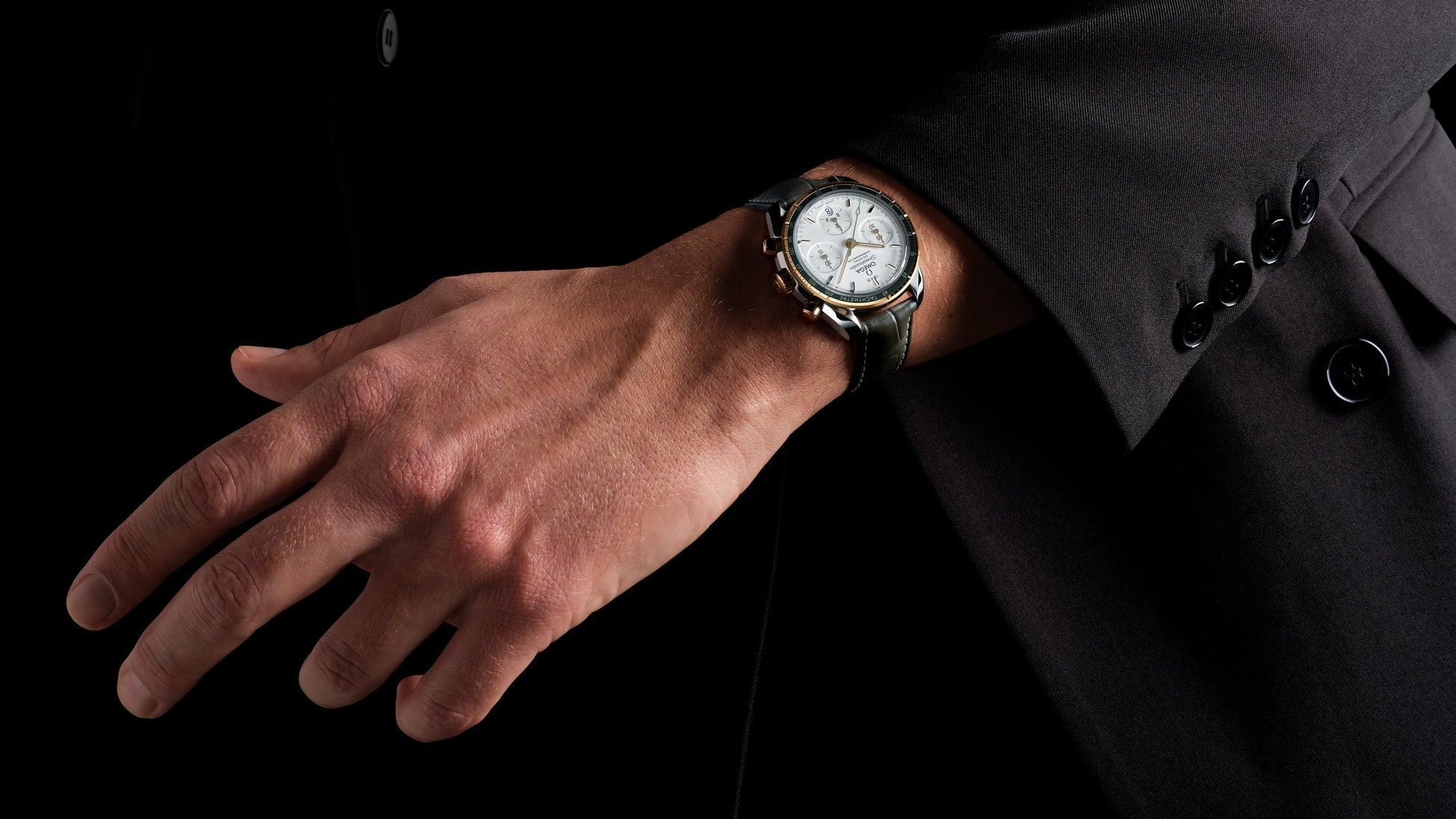 Speedmaster 38 38 mm, steel ‑ yellow gold on leather strap