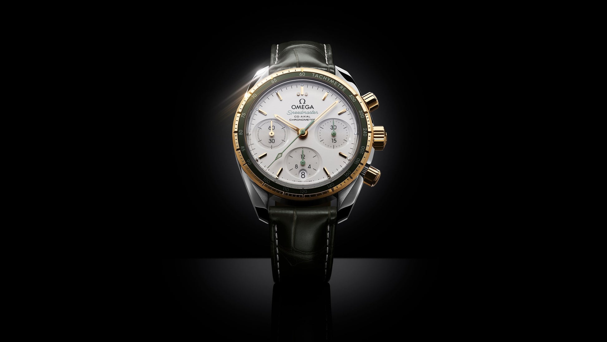 Speedmaster 38 38 mm, steel ‑ yellow gold on leather strap
