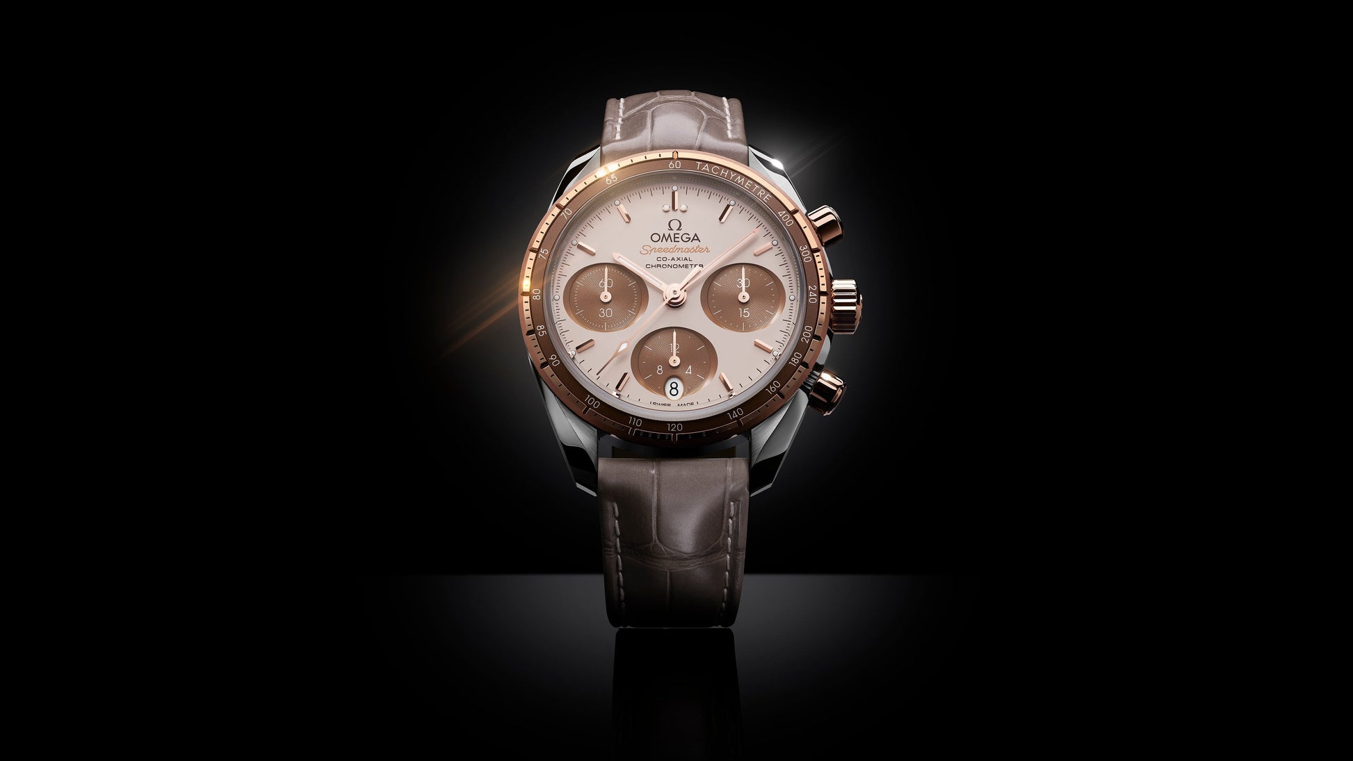 Speedmaster 38 38 mm, steel ‑ Sedna™ gold on leather strap